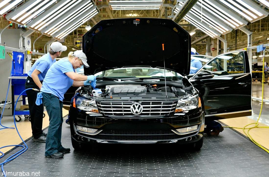 Line inspection workers check out a Volkswagen AG 2012 Passat at the company's factory in Chattanooga, Tennessee, U.S., on Wednesday, June 1, 2011. Volkswagen of America Inc. reported May sales of 30,100 vehicles, a 27.9 percent increase from a year earlier. Photographer: Mark Elias/Bloomberg via Getty Images