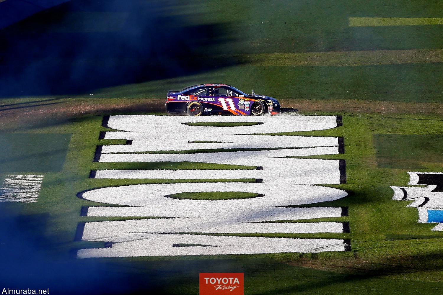 13-21 February, 2016, Daytona Beach, Florida, USADenny Hamlin, FedEx Express Toyota Camry celebrates his win ©2016, Russell LaBountyLAT Photo USA