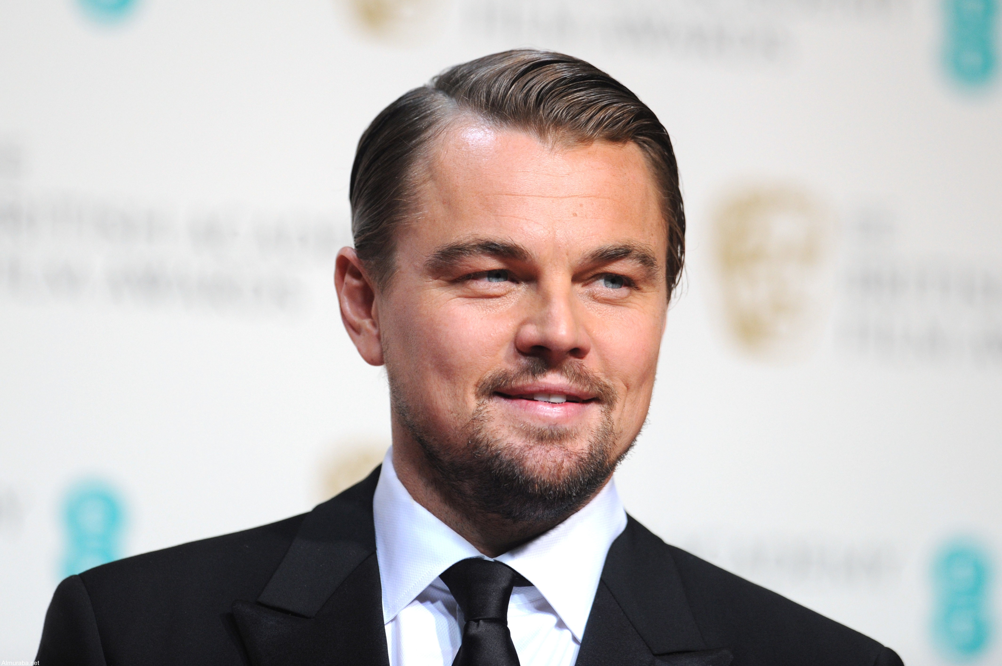 US actor Leonardo DiCaprio poses after presenting an award at the BAFTA British Academy Film Awards at the Royal Opera House in London on February 16, 2014. AFP PHOTO / CARL COURT        (Photo credit should read CARL COURT/AFP/Getty Images)