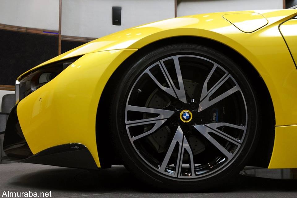 Yellow BMW i816