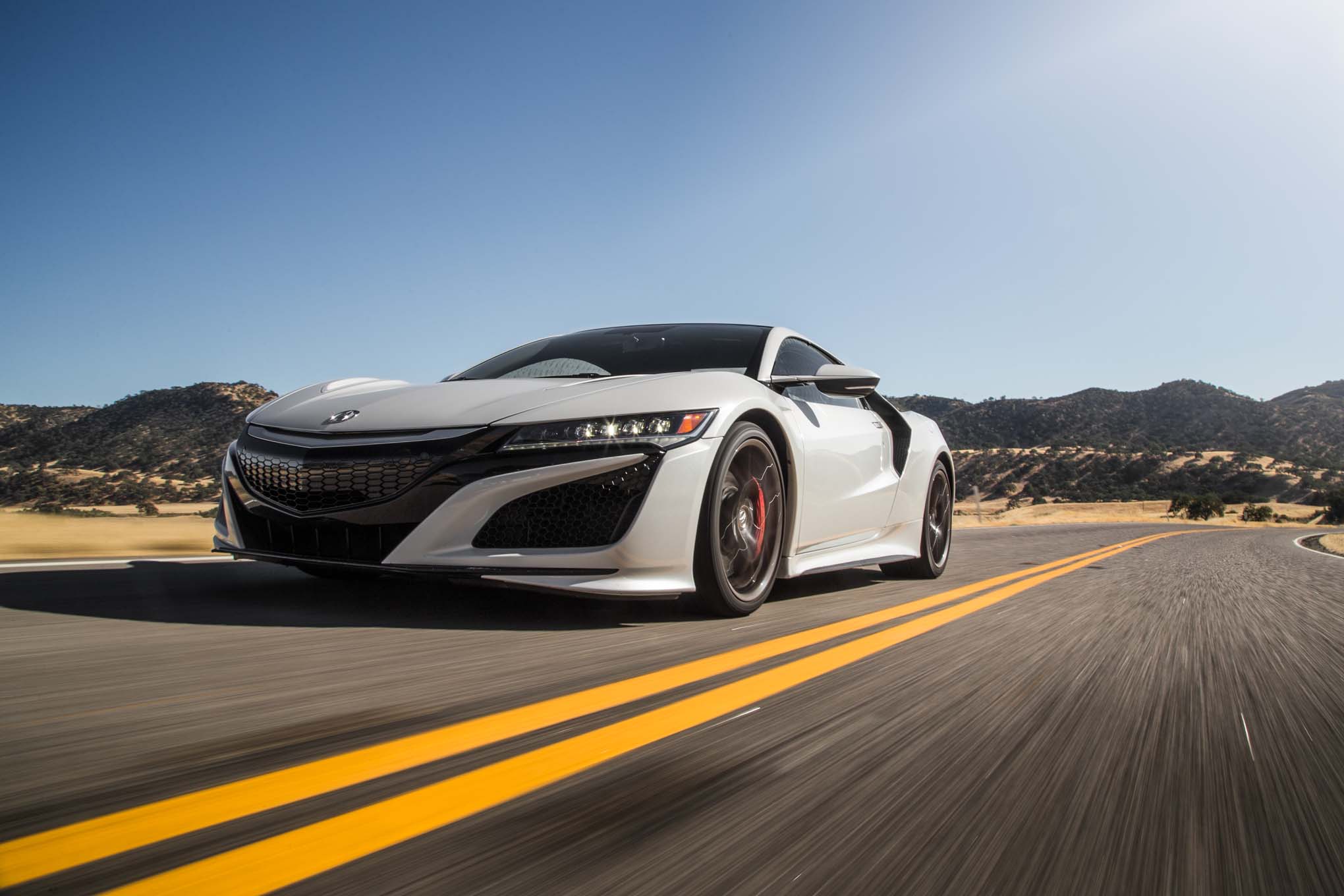 2017-acura-nsx-front-three-quarter-in-motion-low