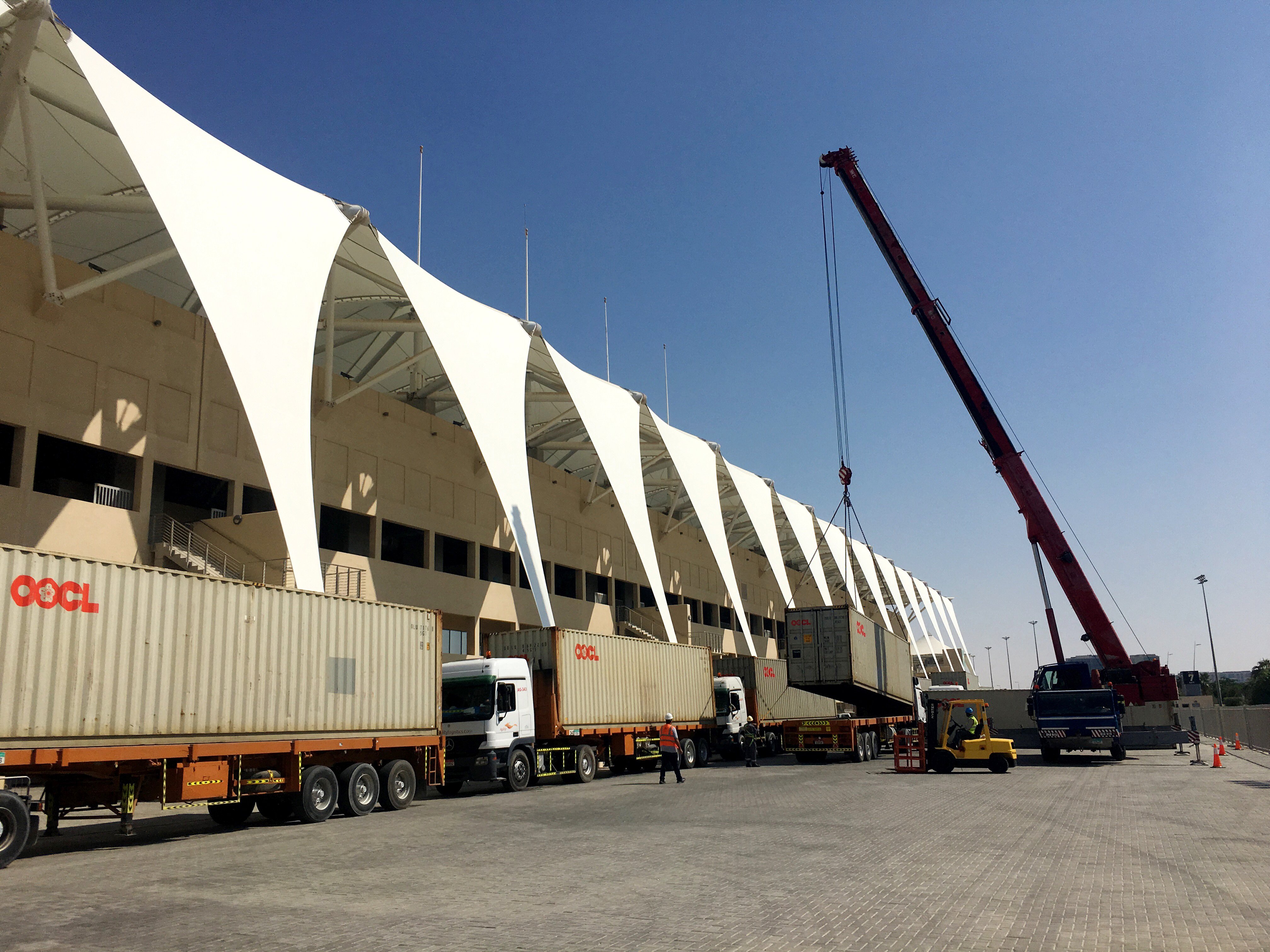 trailers-full-of-team-equipment-being-unloaded