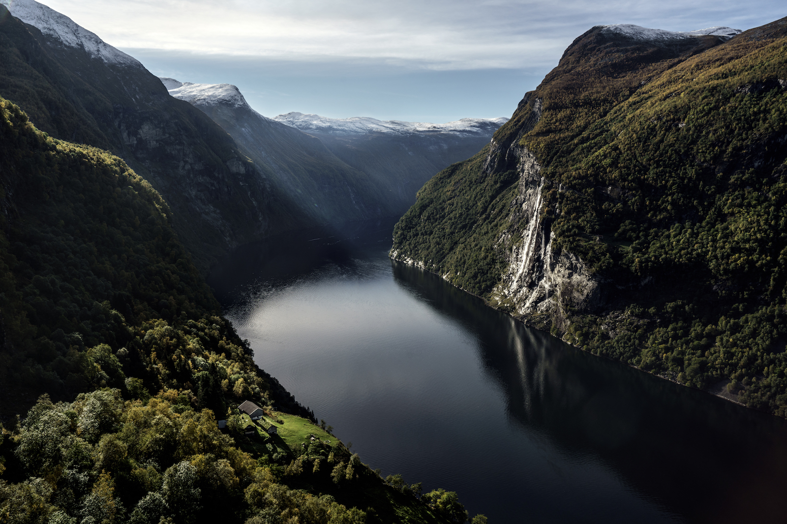 NORWAY. 2016. Geiranger fjord.  Looking towards the "seven sisters" waterfall, with Skageflå, and abandoned farm, in the foreground.